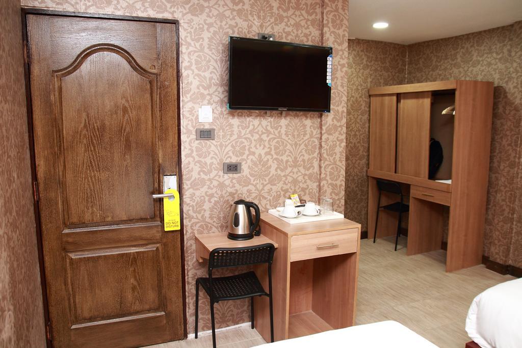 Harrys Suite Hotel Μπανγκόκ Δωμάτιο φωτογραφία