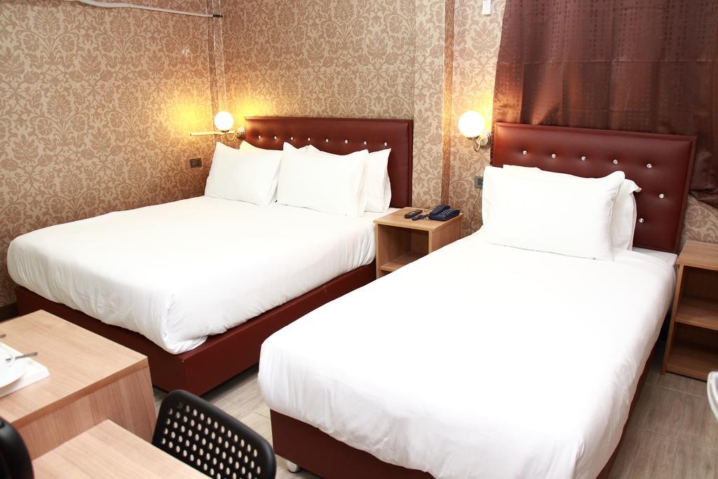 Harrys Suite Hotel Μπανγκόκ Δωμάτιο φωτογραφία