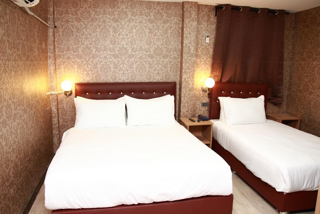 Harrys Suite Hotel Μπανγκόκ Δωμάτιο φωτογραφία